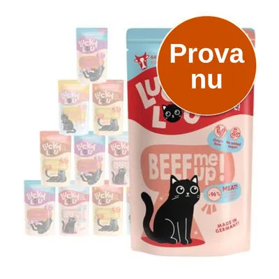 Lucky Lou BEEF me up! kattgodis, förpackning med svart katt och texten 'Prova nu' i orange cirkel. Flera smaker synliga i bakgrunden.
