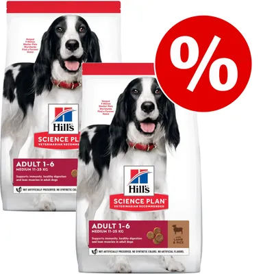 Duas embalagens de Hill's Science Plan Adult 1-6 Medium 11–25 kg, cordeiro e arroz, com símbolo de percentagem vermelho indicando promoção. Texto visível em inglês.