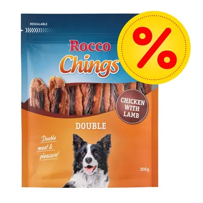 Rocco Chings Double Chicken with Lamb, 200 g. Opakowanie z przysmakiem dla psa, widoczny napis: Double meat & pleasure! oraz żółta etykieta z symbolem procenta.