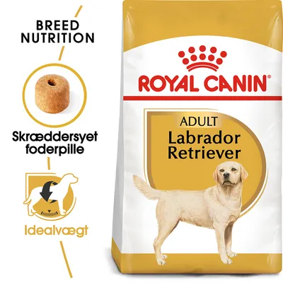 Royal Canin Adult Labrador Retriever hundefoder, tekst: Breed Nutrition, Skræddersyet foderpille, Idealvægt. Billede af foderpille og hund på emballagen.