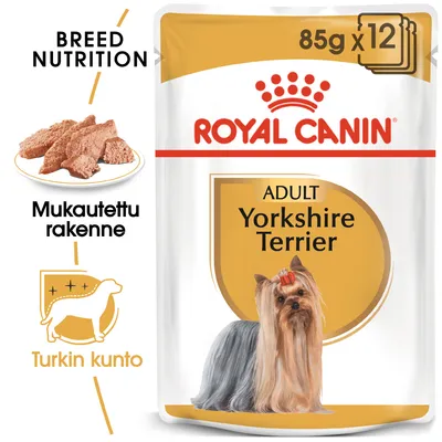Royal Canin Adult Yorkshire Terrier 85 g x12. Mukautettu rakenne, turkin kunto. Breed Nutrition. Kuvassa annospussi ja Yorkshireterrieri.