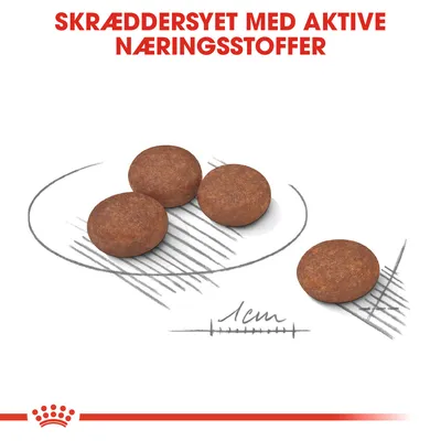 Fire runde foderpiller, målestreg med 1 cm markering. Tekst: SKRÆDDERSYET MED AKTIVE NÆRINGSSTOFFER.