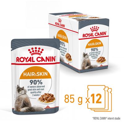 ROYAL CANIN HAIR & SKIN, 90% of owners observed good skin and coat quality after 3 weeks, 85 g x 12. Kat og foder synligt på emballagen. Tekst på engelsk.