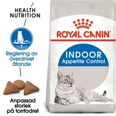 ROYAL CANIN INDOOR Appetite Control kattfoder. Text: Reglering av överdrivet ätande, anpassad storlek på torrfodret. Bild på grå katt och foderbitar.