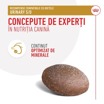 Recompense compatibile cu dietele Urinary S/O, concepute de experți în nutriția canină, conținut optimizat de minerale. Imagine cu o recompensă maro pentru câini.