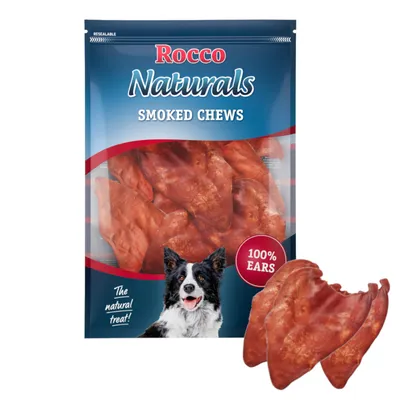 Rocco Naturals Smoked Chews, sachet transparent avec friandises en forme d’oreilles, texte visible : 100% ears, The natural treat!