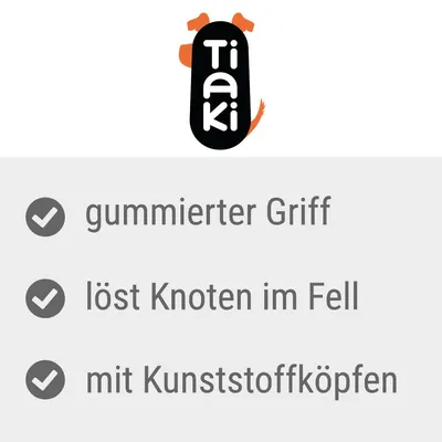 Tiaki. Gummierter Griff, löst Knoten im Fell, mit Kunststoffköpfen.
