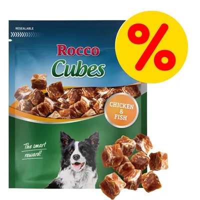 Rocco Cubes, snack per cani con pollo e pesce. Scritta 'CHICKEN & FISH' sulla confezione, simbolo percentuale giallo-rosso in alto a destra.