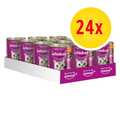 Confezione da 24 lattine di cibo per gatti Whiskas, visibile il marchio Whiskas su ogni lattina e sulla scatola. Etichetta gialla con testo rosso '24x'.