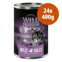 Wild Freedom Wild Hills Chicken with Duck, 24x400g, 100% grain-free recipe. Immagine di una lattina con gatto e paesaggio montano sullo sfondo.