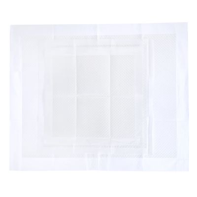 Tapis absorbant rectangulaire blanc avec surface gaufrée, bords larges visibles, matériau plastique apparent, sans marque ni texte visible.