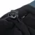 Close-up of an adjustable drawstring with a toggle fastener on a black fleece fabric, showing the tightening mechanism for secure fit.