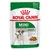 Plic hrană umedă Royal Canin MINI Adult, 85 g, pentru câini mici până la 10 kg. Text vizibil: 'All small dogs up to 10kg', 'De 10 mois à 12 ans', 'Sauce'.