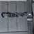 Trixie safety belt with two carabiners and metal ring, suitable for securing in the car. Load capacity up to 12 kN visible on the carabiners.