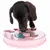 Dachshund playing with a pink interactive toy featuring various compartments and movable parts.