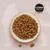 Cosma Pure Love Dry. Dry food in brown pieces, served in a white bowl.