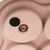 Close-up of a beige toy with rotating elements and a black felt dot. Suitable for interactive play or food hiding.