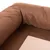 Close-up van bruin textiel met gewatteerde rand en netstof, mogelijk onderdeel van een huisdierenbed of tas.