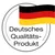 Texte en allemand : Deutsches Qualitäts-Produkt, avec un drapeau allemand. Texte non traduit.