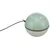 Green and white ball-shaped toy with fishbone motifs, attached to a black cord.