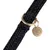 Black collar with fishbone pattern, golden metal ring and pendant engraved with the letter 'N'.