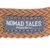 Nomad Tales München. Ετικέτα μάρκας σε καφέ πλεκτό υλικό.