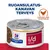 Hill's Prescription Diet i/d stress -kana ja vihannekset, ruoansulatuskanavan terveys. Teksti: CHICKEN AND VEGETABLES. Purkkiruoka näkyvissä.