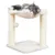 Cat tree with two sisal posts, soft lying surface and play ball. Cat is lying relaxed on the surface.