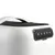 Transport box with white plastic housing, black ventilation grille and ergonomic carrying handle.