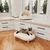 Two cats on modern white furniture: one in a cosy cave bed, the other on a padded lounger. Both pieces with soft padding.