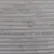 Detailní záběr na šedý, žebrovaný textilní materiál s měkkou texturou.