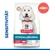 Hill's Science Plan Hypoallergenic hondenvoer met zalm, graanvrij. Gevoeligheid benadrukt. Verpakking toont witte hond met rode halsband.
