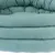 Close-up van een gevoerd, turquoise huisdierenbed met zachte stoffen bekleding.