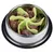 Stainless steel food bowl with green anti-gulp insert, filled with wet food.