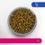 Bowl filled with brown and green dry food pieces, chicken icon in top right corner, pink label at bottom showing 1+.