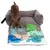 Brown dog examines a grey snuffle mat with green, blue and beige fabric elements in various shapes.