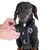 Schwarzes Tiaki-Hundegeschirr wird an einem Dackel angepasst. Sichtbar sind reflektierende Streifen und verstellbare Schnallen.