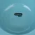 zooplus basics. Logo on a light blue product, possibly a bowl or container.