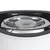 Gros plan sur une gamelle pour animaux en acier inoxydable avec rebord noir, intérieur brillant et forme circulaire.