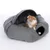 Grey cat bed with cave and play opening, cat sitting inside. Visible: soft material and integrated play ball.