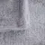 Close-up of grey, soft fabric with fluffy texture, suitable for pet beds or blankets.