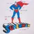 Illustration de Superman avec texte anglais : Heat vision, Flight, Super-strength, Super-speed. Logo SUPERMAN en couleurs et mention Man of steel.