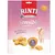 Balení Rinti Extra Sensible, viditelný text: gefriergetrocknet, ohne Zusätze, Huhn pur, nur 1+ tierisches Protein, Huhn für empfindliche Hunde. Kousky masa a pes na obalu.