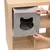 Grey felt box with cat head cut-out, suitable for shelf compartments. Hand shows easy assembly by sliding into shelf.