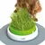Catit cat grass set with green container and grey base. Cat sniffs fresh grass.