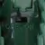Close-up of a green switch with the labels OFF and ON.
