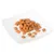 Brown, square dry food pieces on a white plate.