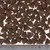 Crocchette triangolari marroni, scala in basso mostra una dimensione di circa 1 cm per pezzo.