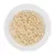 Close-up of shredded, light brown wet food on a white plate.