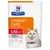 Hill's Prescription Diet Urinary Care c/d multicare stress kattenvoer, aanbevolen door dierenartsen, met kip. Verpakking toont witte kat en iconen voor klinische voeding en S+OX Shield.